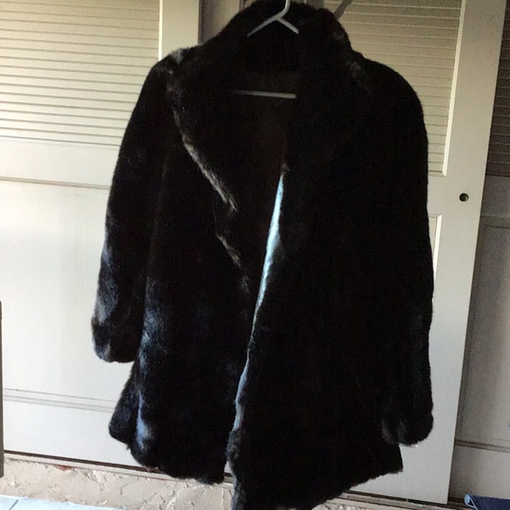 Faux fur jacket. Wear dressy or casual.